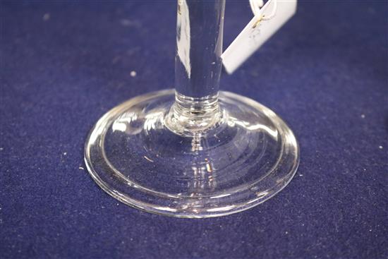 A wine glass, c.1740, with a bell bowl, on plain stem, on a folded foot, 6in.